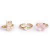 Set van drie gouden prinsessenringen van Great Pretenders met een prinses, fonkelende steen en roze bloem
