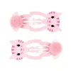 Twee roze Minou haarclips van Souza! met een kattengezicht, oortjes en zachte pompons.