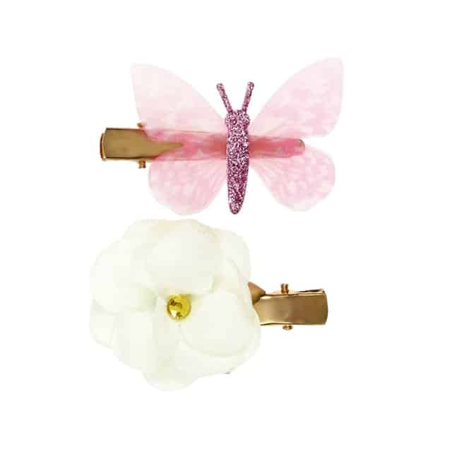 Set van twee Souza! haarklemmetjes: een roze glittervlinder en een witte bloem met gouden hart