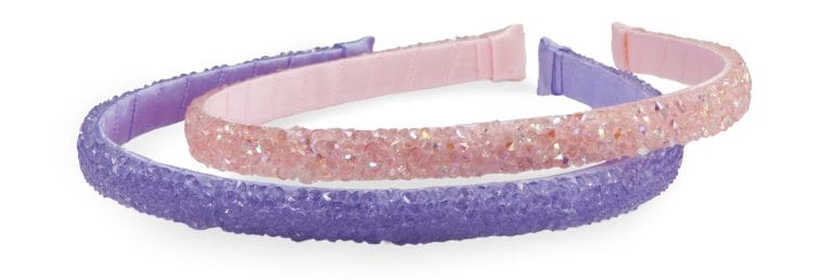 Set van twee glitter haarbanden, een paarse en een roze haarband met fonkelende steentjes.