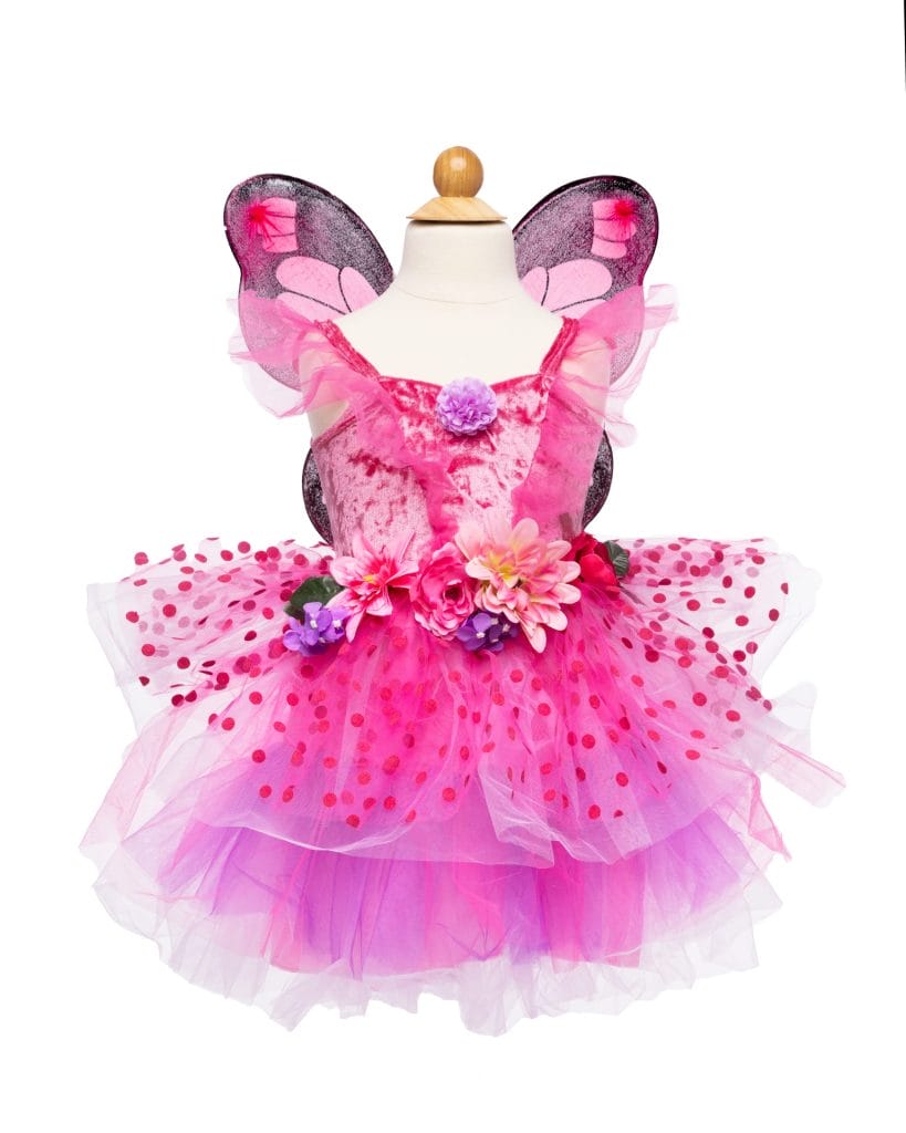 Roze elfjes jurken met vleugels, bloemen in de taille en een meerlaagse tule rok met stippen op een paspop