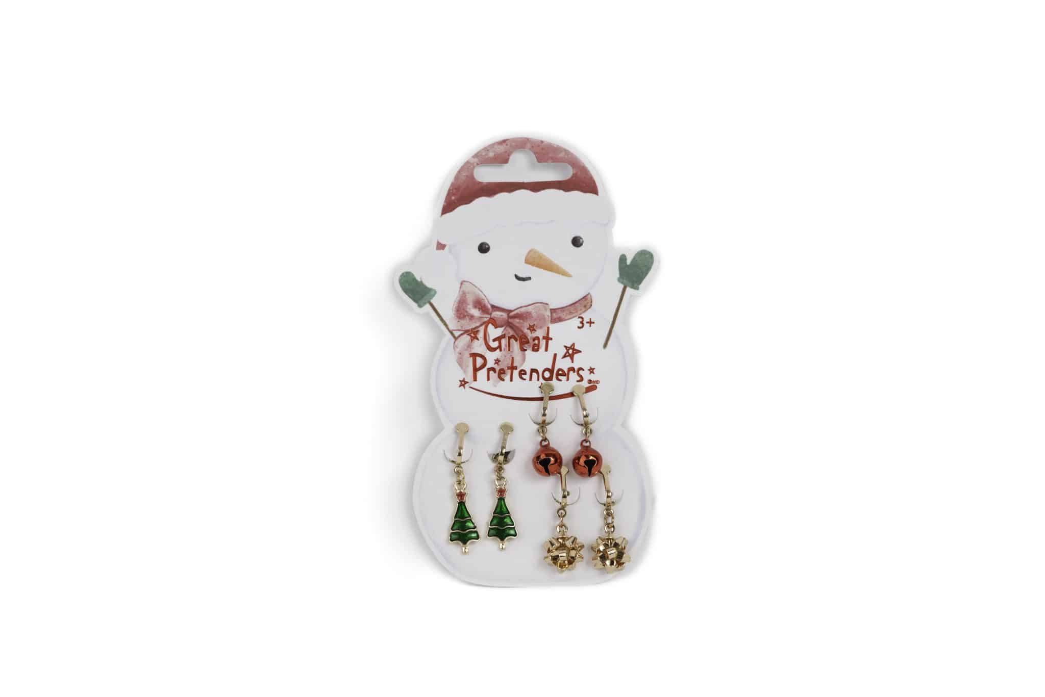 Set Great Pretenders kerstboom oorbellen op een sneeuwpopkaart met drie paar kerstfiguurtjes