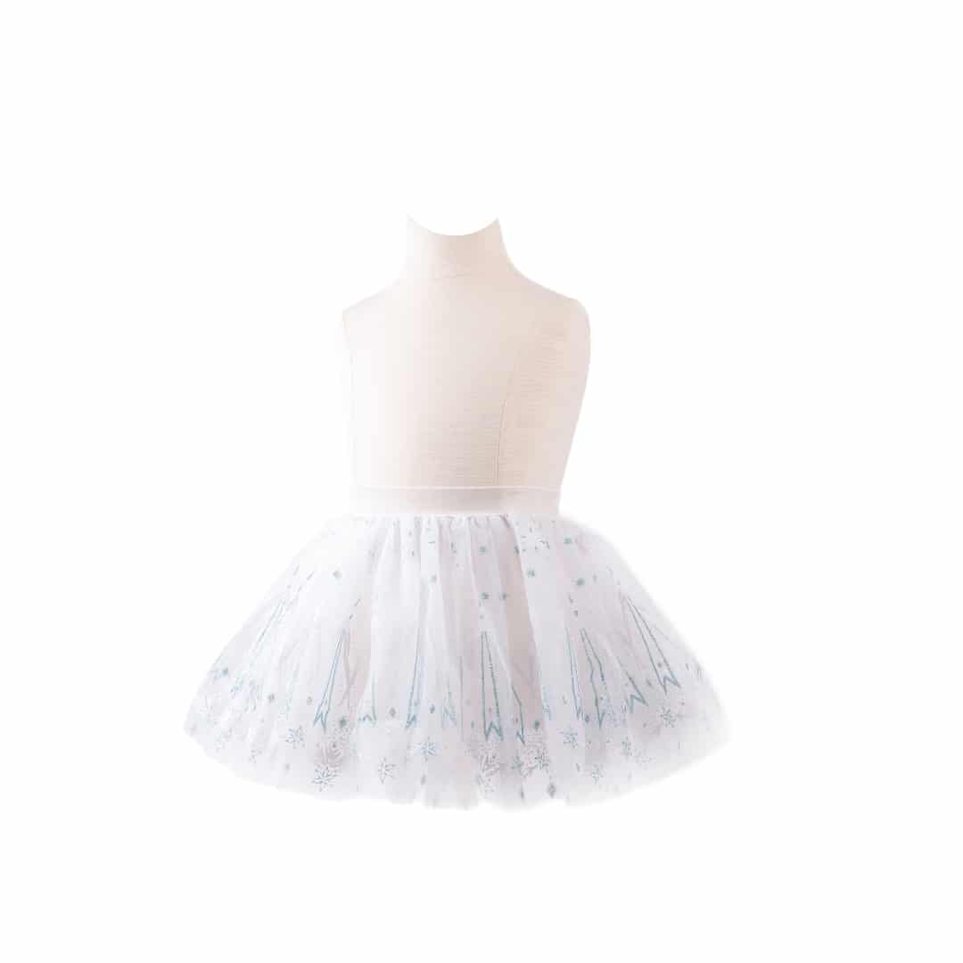 Witte tutu rok van Great Pretenders op een paspop, met meerdere lagen tule en zilveren sterrenprint